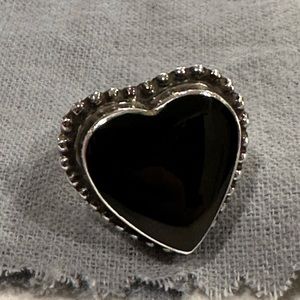 Women’s Sterling and Onyx heart ring.